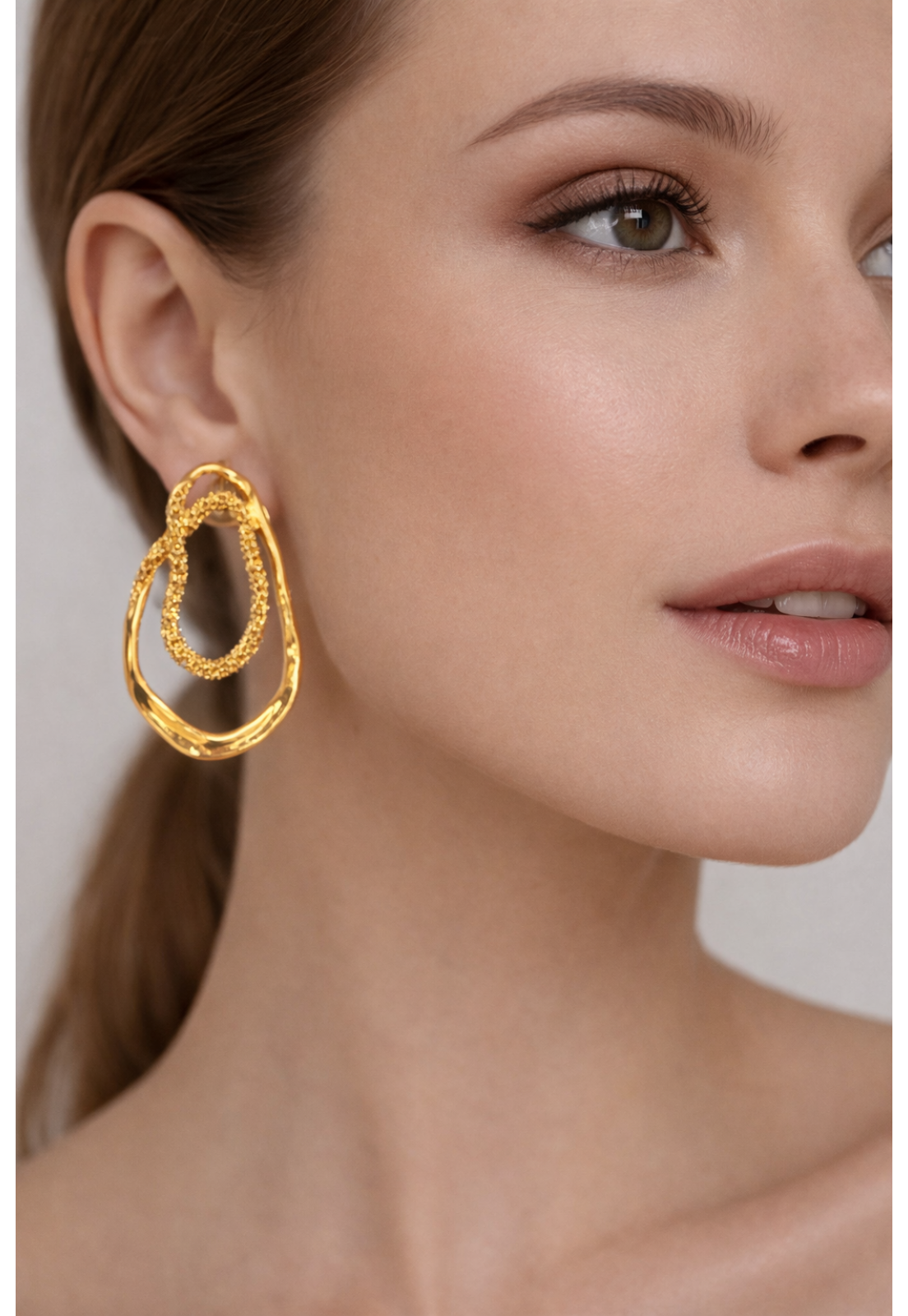 BRINCO GEOMETRICO DOURADO